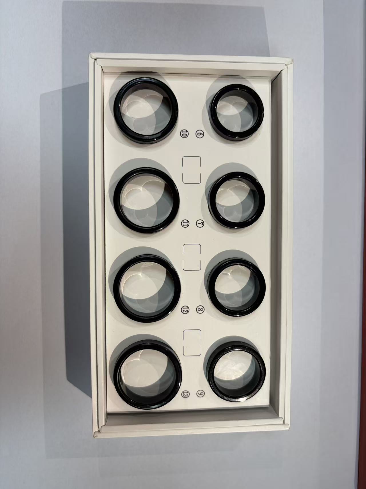 True-wireless earbud photographed in detail
